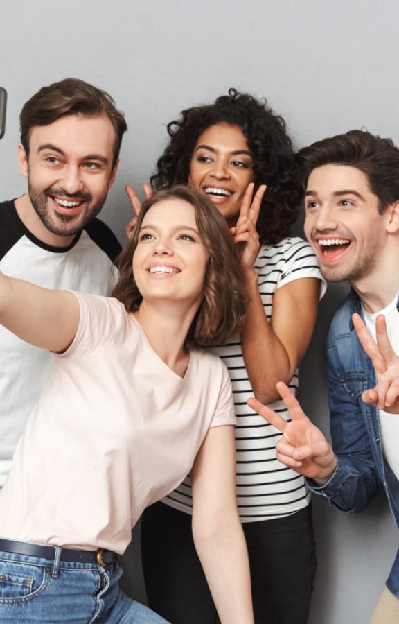 Group of young adults taking a selfie