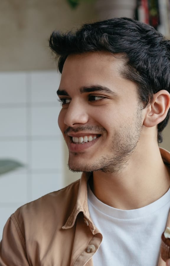 Man and woman looking at each other and smiling
