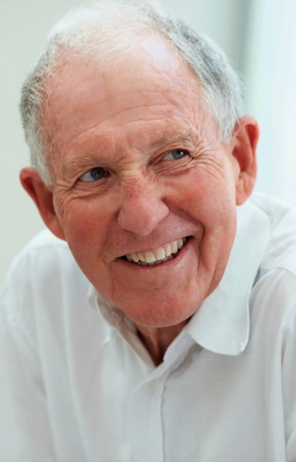 Doctor talking to an older male patient